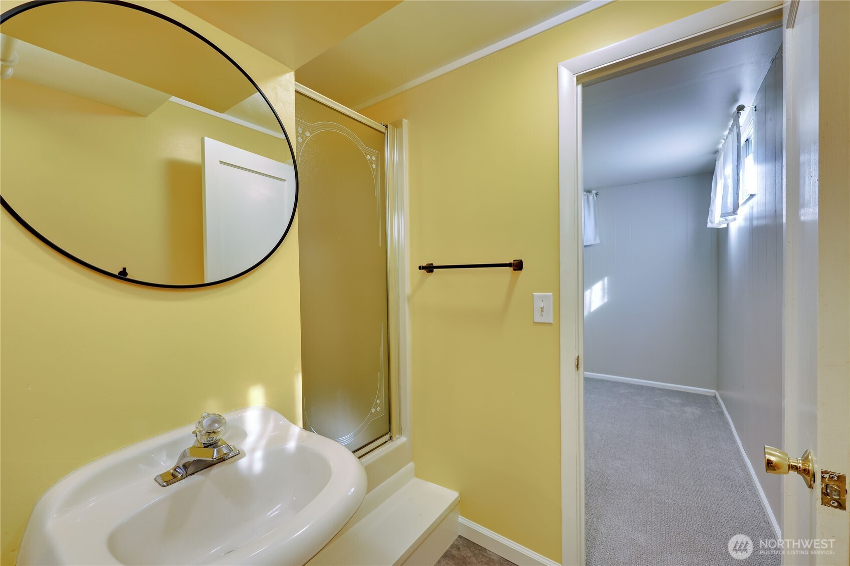 1518 Winfield Avenue Bremerton, WA 98310 - Photo 29 of 38 a bathroom with a sink and a mirror