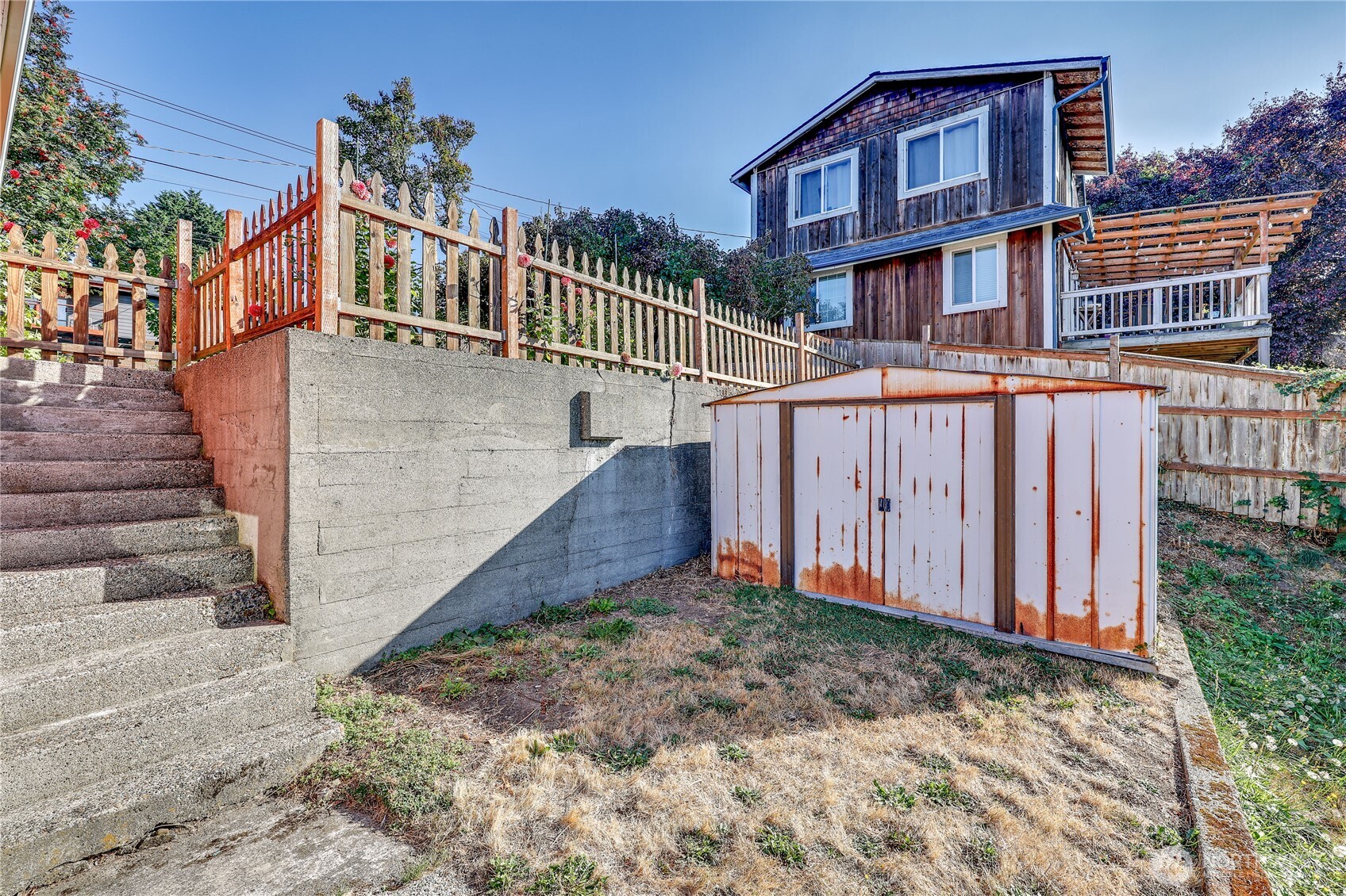 1518 Winfield Avenue Bremerton, WA 98310 - Photo 32 of 38 a view of a house with wooden stairs