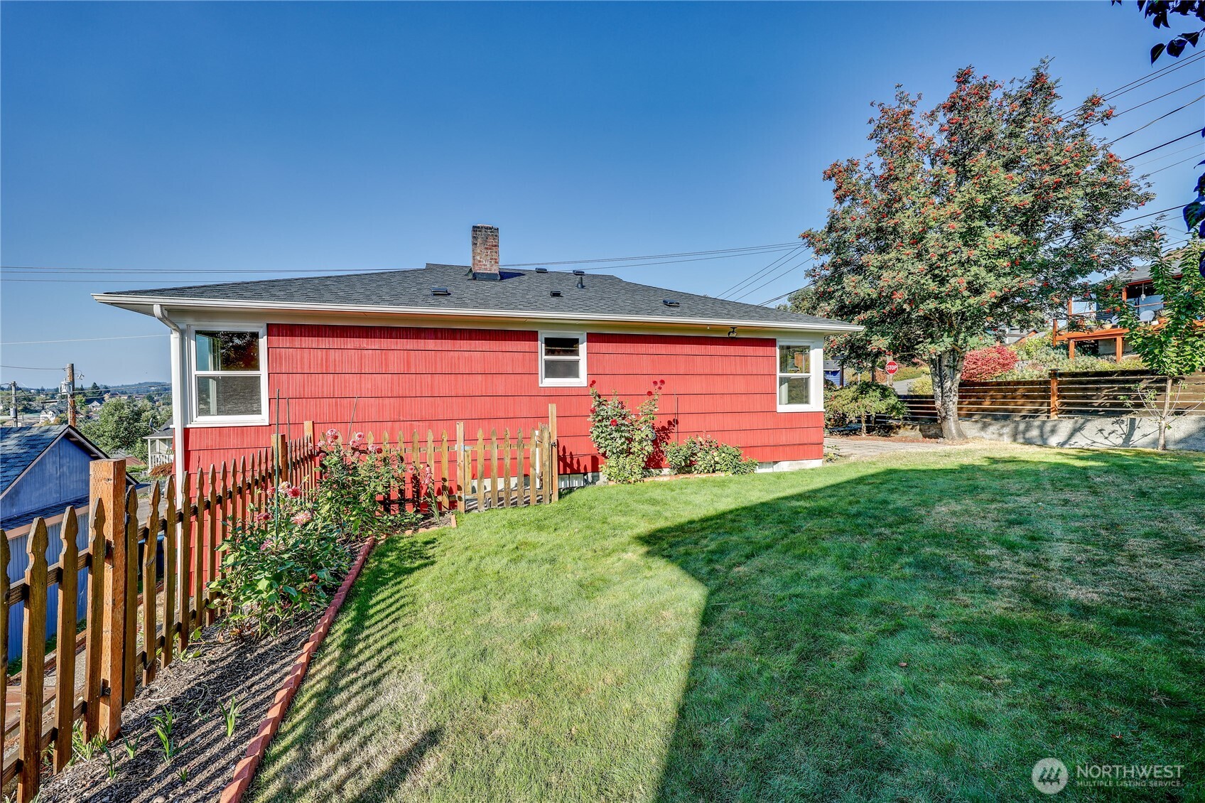 1518 Winfield Avenue Bremerton, WA 98310 - Photo 5 of 38 a front view of a house with garden
