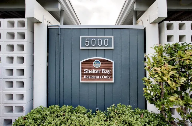 a sign that is on a brick building