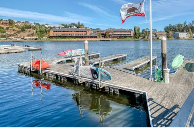 a small pool with an outdoor seating