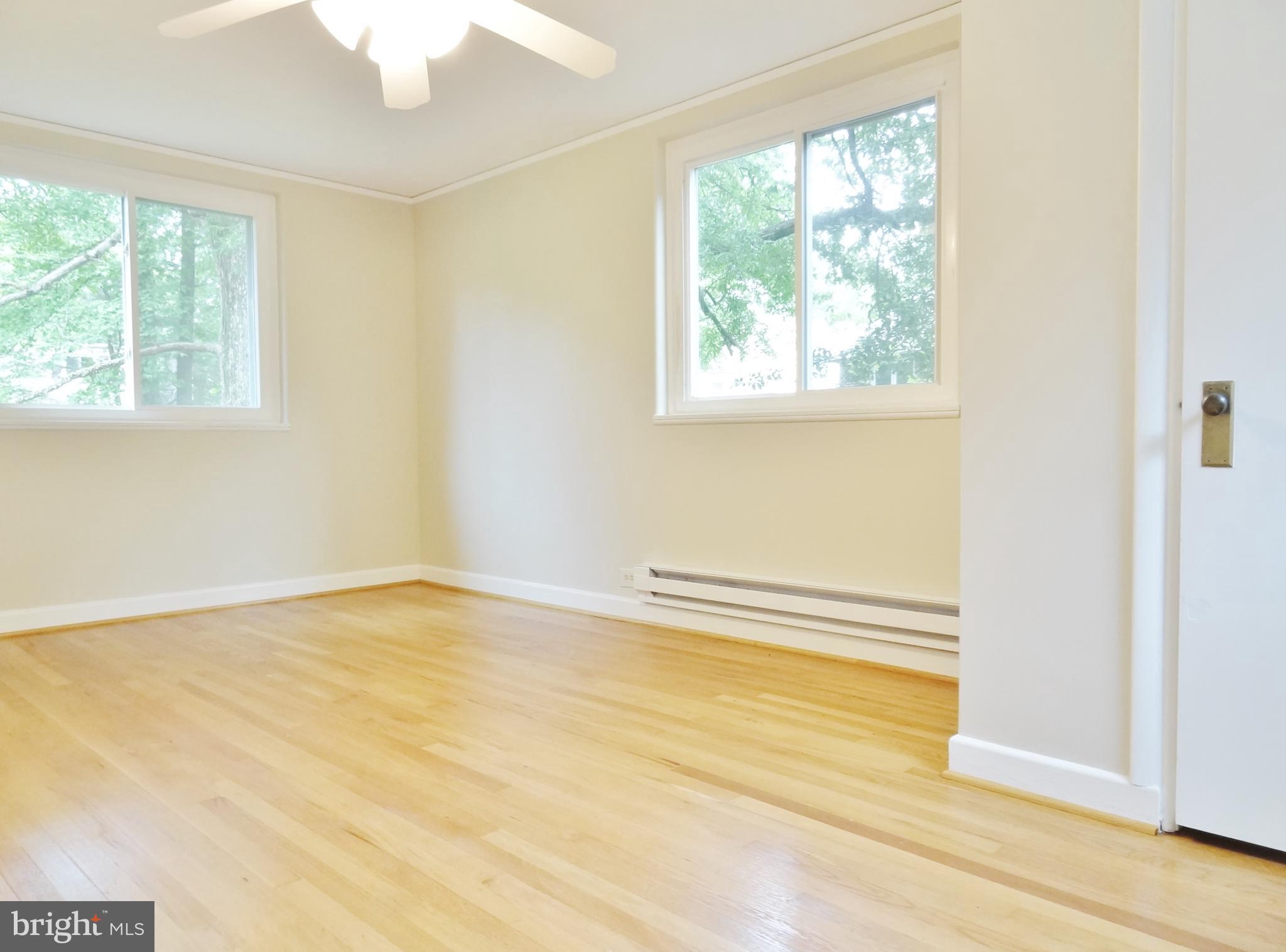 62 Crescent Road, Unit A Greenbelt, MD 20770 - Photo 12 of 17 Lg 2nd Floor BR w/polished Hdwd Floors