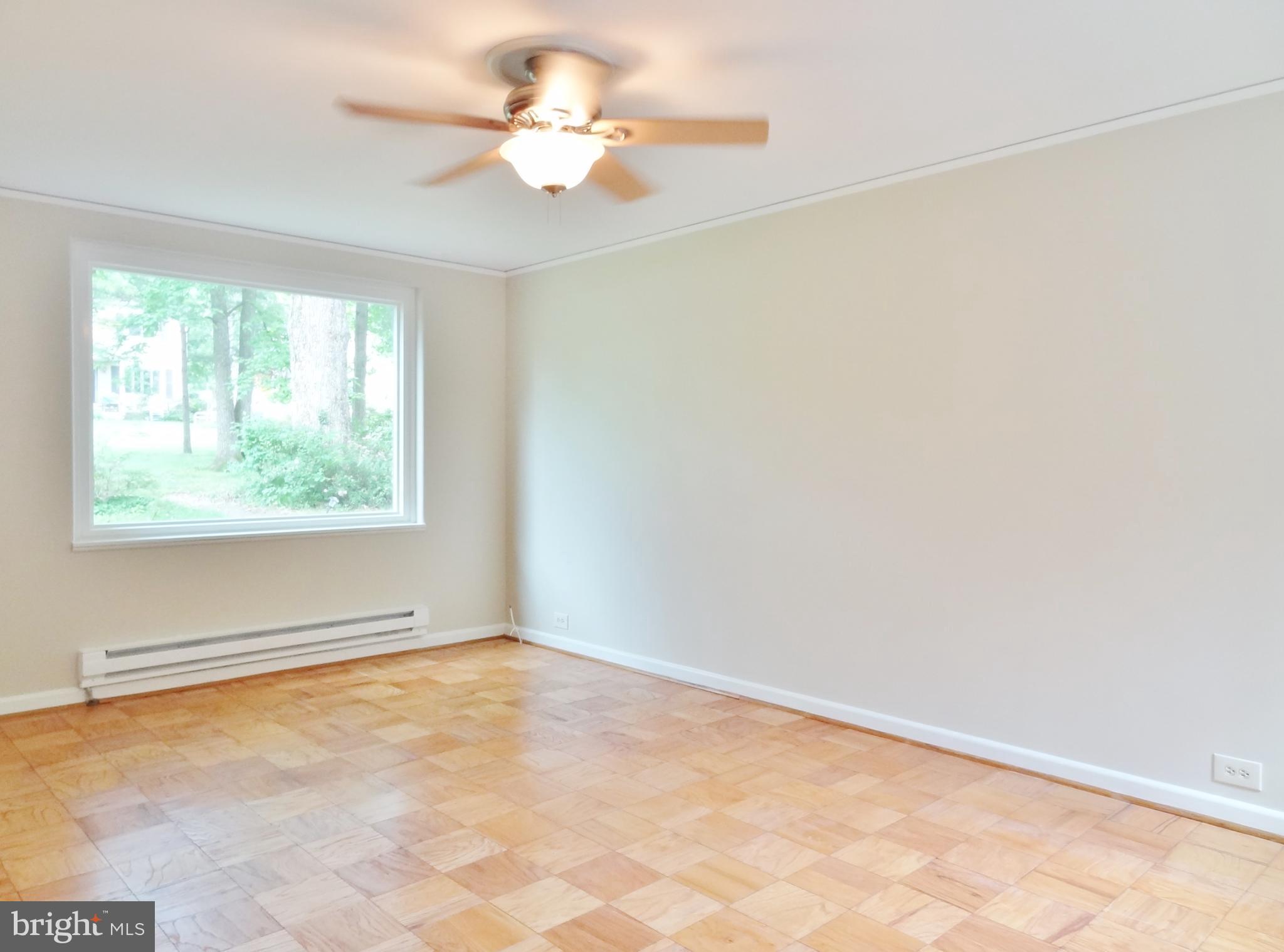 Living Room w/Parquet Wood Floors & Ceiling Fan