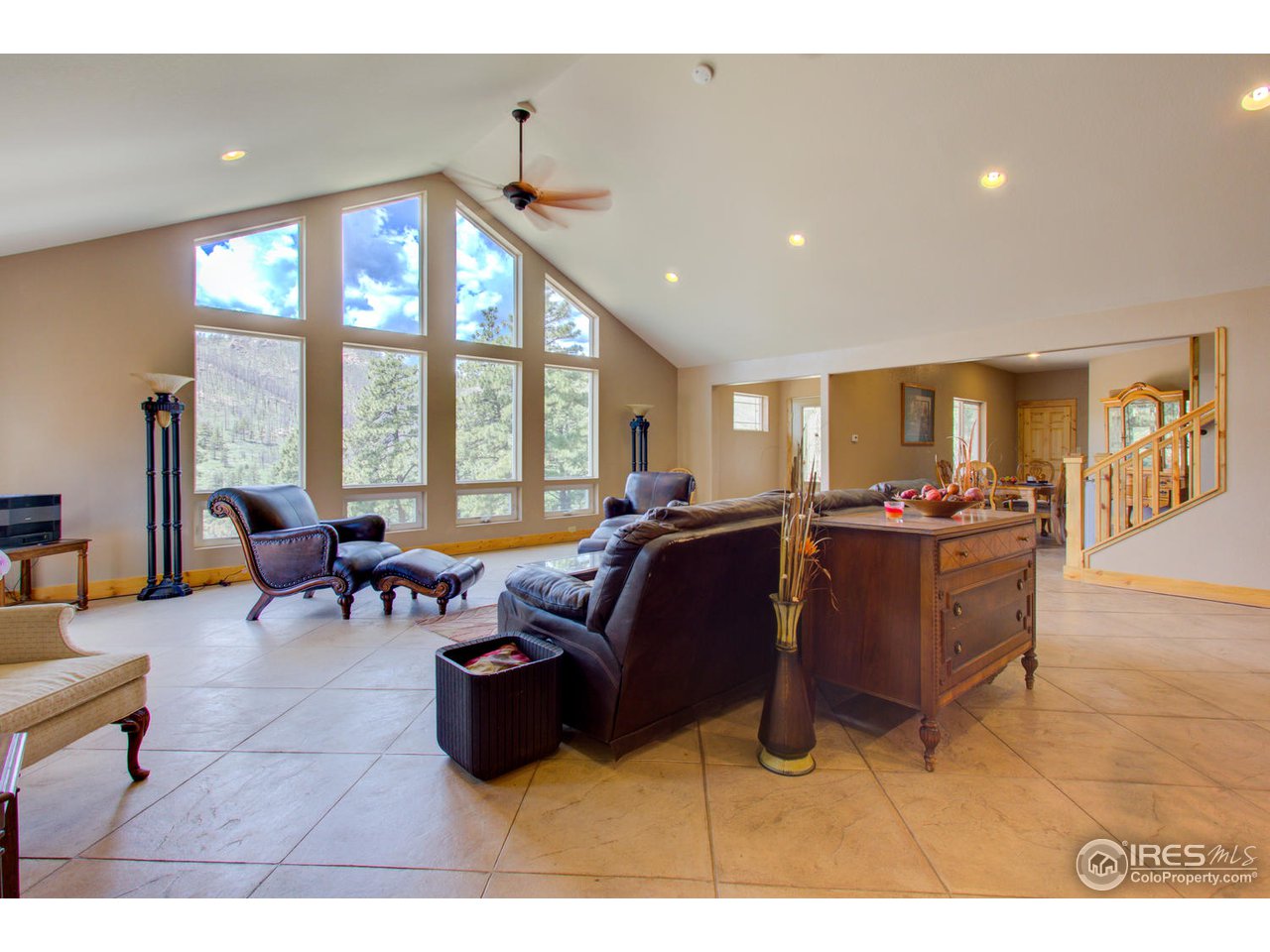 420 Stove Prairie Road Bellvue, CO 80512 - Photo 15 of 34 Living Room to Dining Room