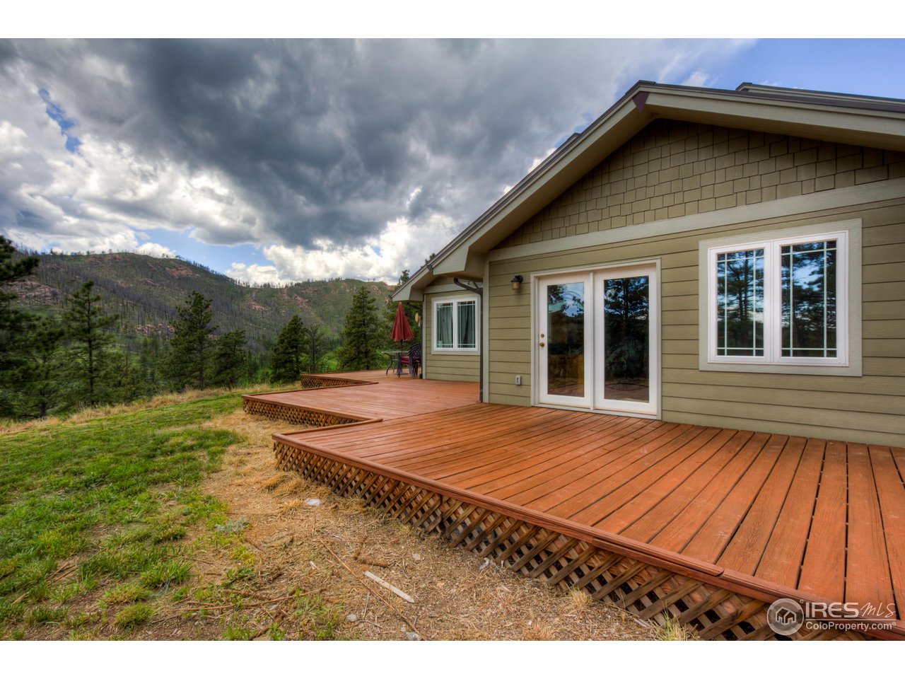 420 Stove Prairie Road Bellvue, CO 80512 - Photo 6 of 34 Master Bedroom Deck