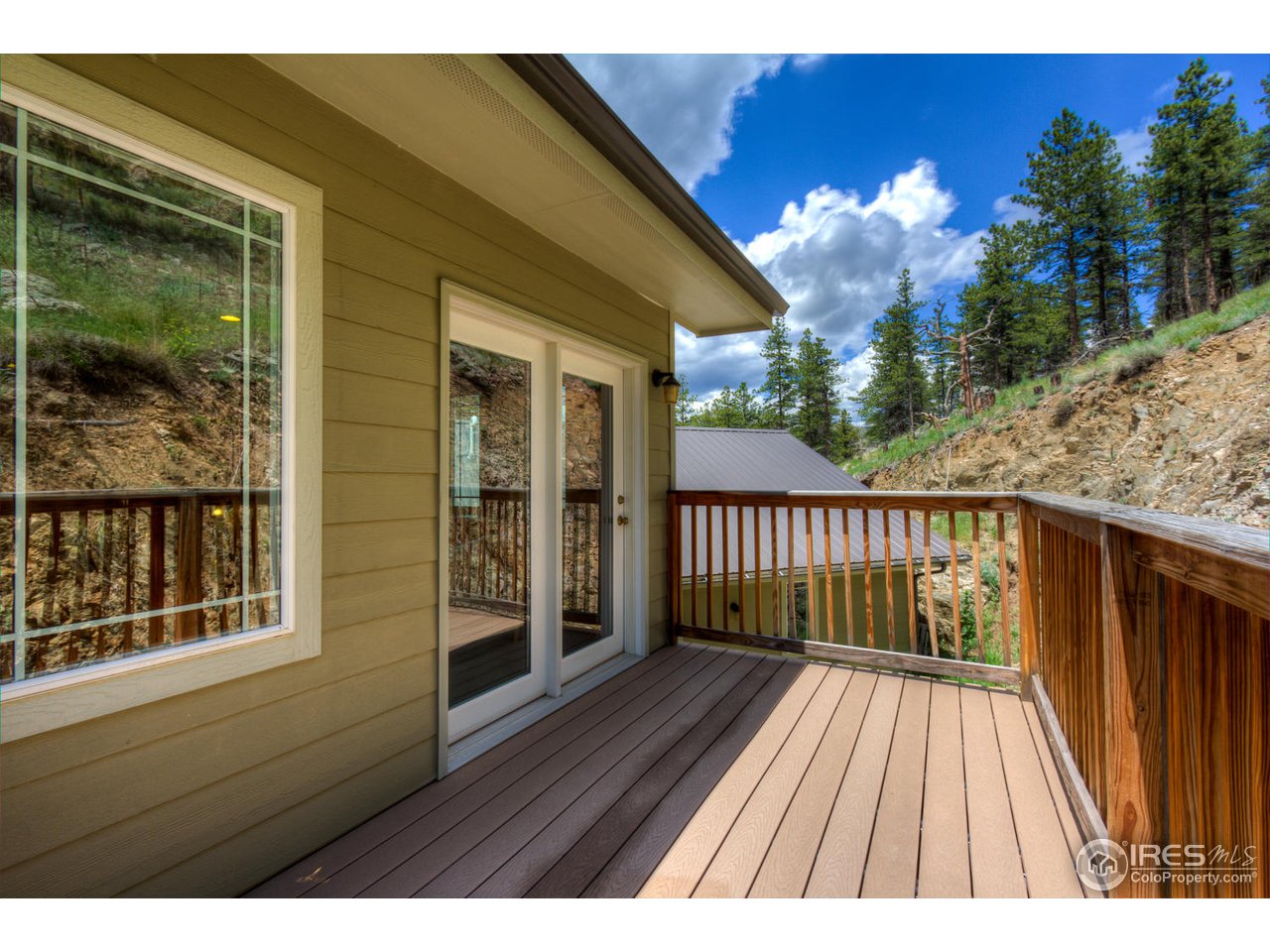420 Stove Prairie Road Bellvue, CO 80512 - Photo 8 of 34 Double Doors to Balcony