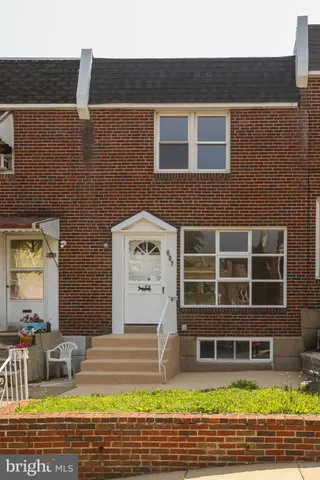 a view of a house with a swimming pool