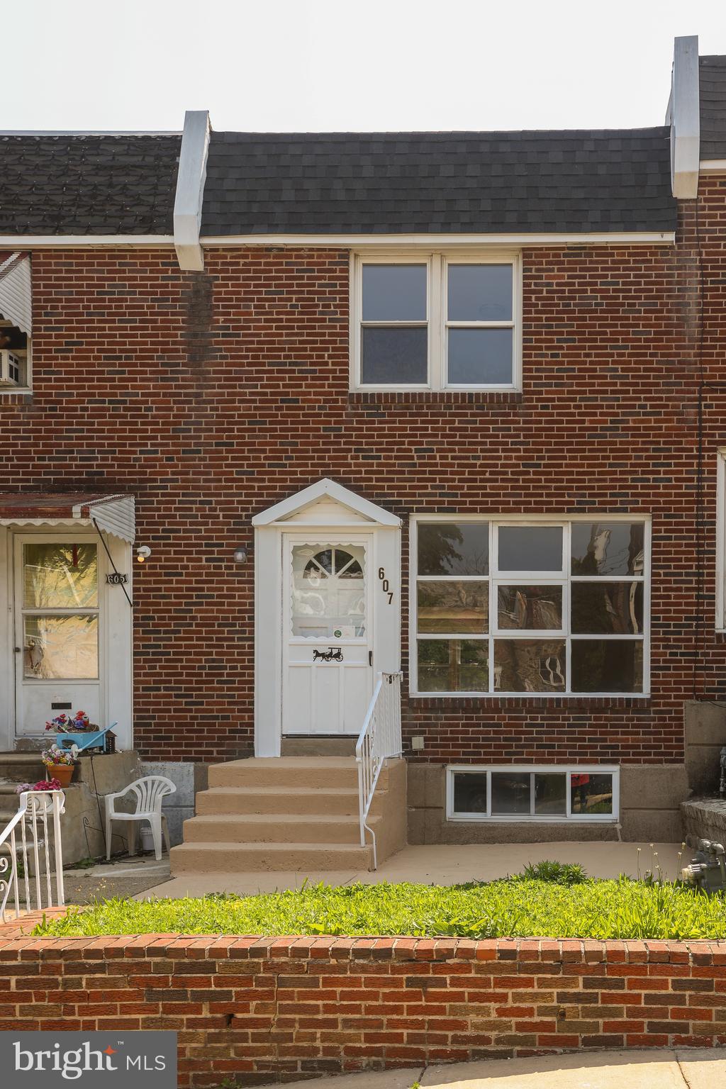 607 Briarcliff Road Upper Darby, PA 19082 - Photo 2 of 23 a view of a house with a swimming pool