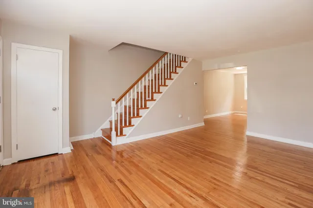 a view of entryway with wooden floor