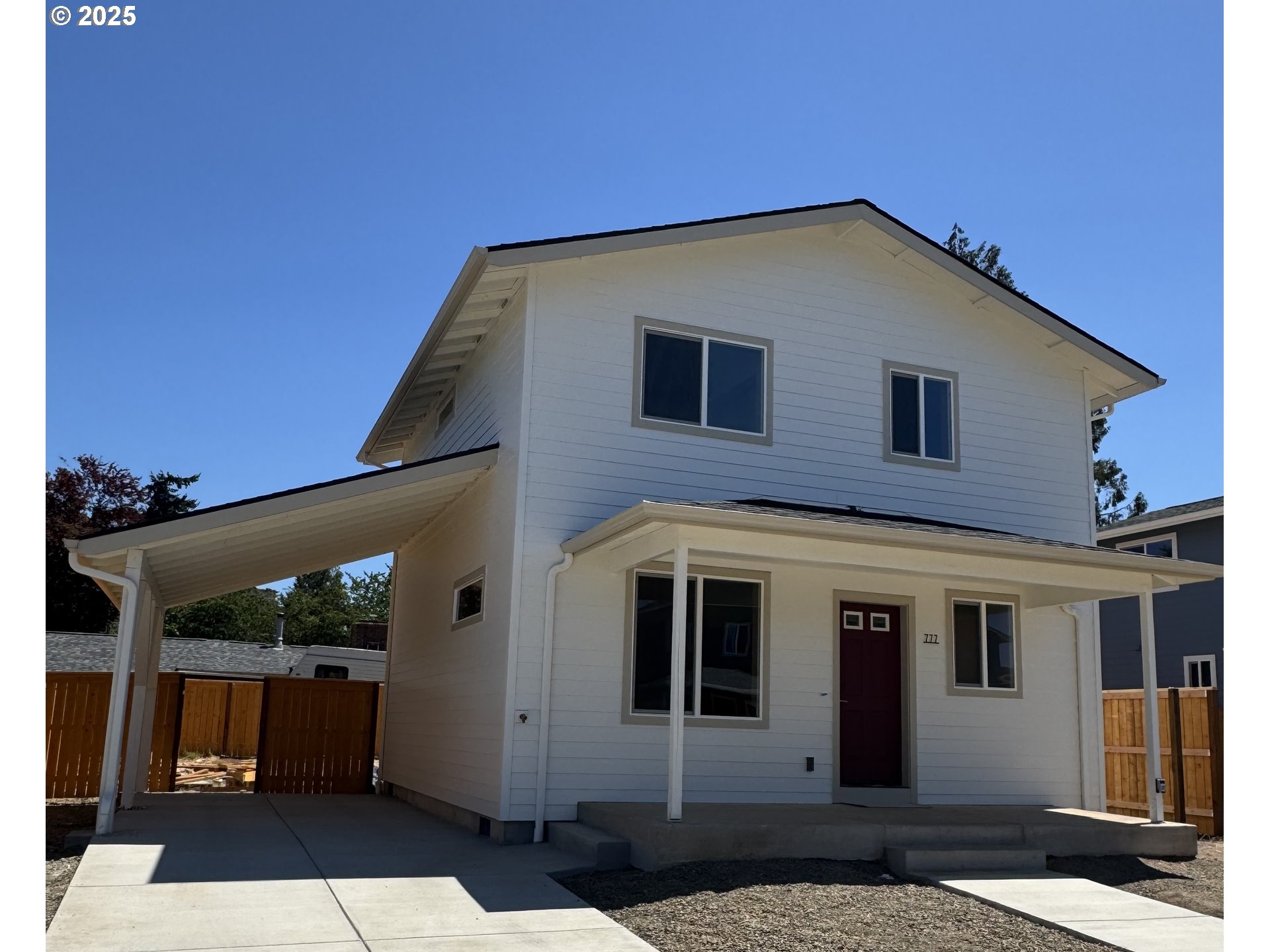 664 ST Charles Street Eugene, OR 97402 - Photo 1 of 17 a view of a house with a yard