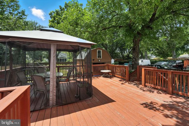 a picture of a bathroom with a shower