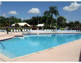 5438 Verona Drive, Unit 812 Boynton Beach, FL 33437 - Photo 26 of 35 a view of a lake with a house