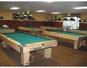 5438 Verona Drive, Unit 812 Boynton Beach, FL 33437 - Photo 31 of 35 a room with pool table and chairs