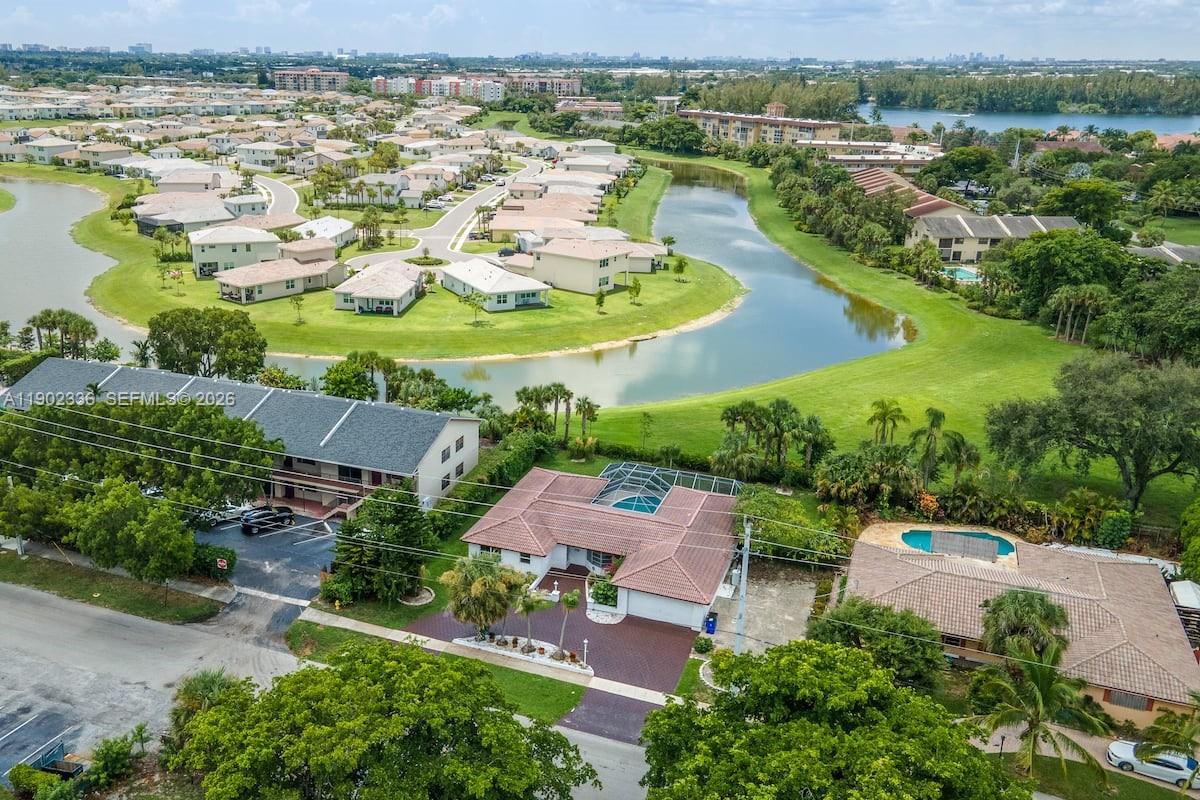 1500 Northwest 45th Street Pompano Beach, FL 33064 - Photo 23 of 23 an aerial view of a house with a lake view