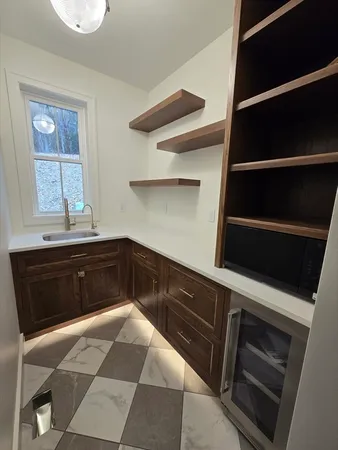 a view of a room with shelves