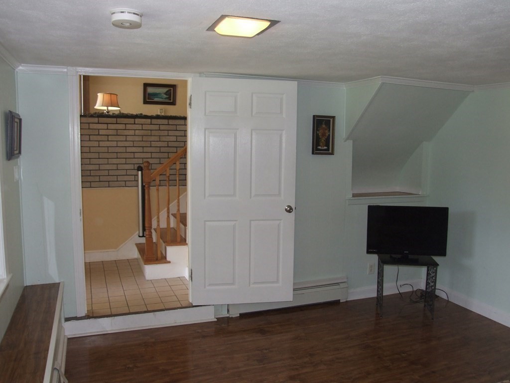 30 Donnell Road Walpole, MA 02032 - Photo 13 of 32 a view of entryway with wooden floor