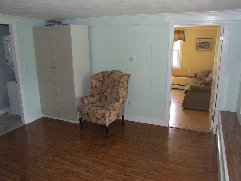 30 Donnell Road Walpole, MA 02032 - Photo 15 of 32 a room with wooden floor and a window