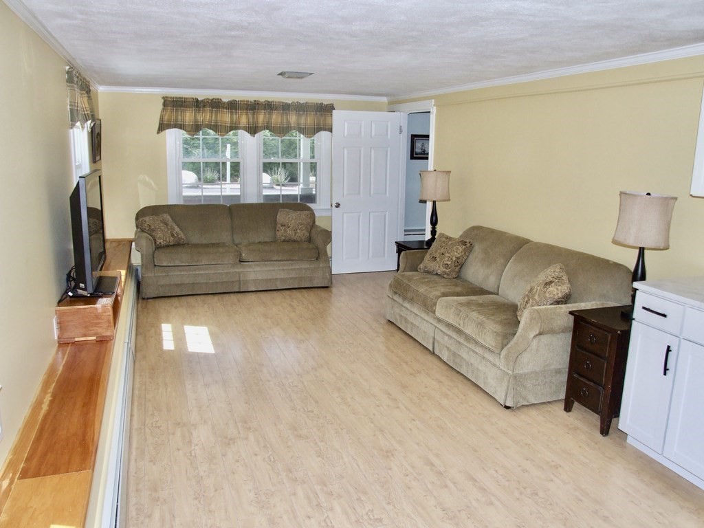 30 Donnell Road Walpole, MA 02032 - Photo 17 of 32 a living room with furniture and a large window