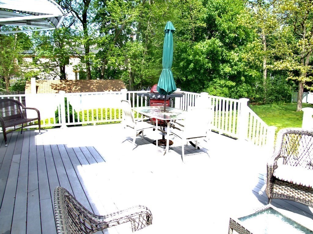 30 Donnell Road Walpole, MA 02032 - Photo 27 of 32 a view of a patio with a bench and chairs