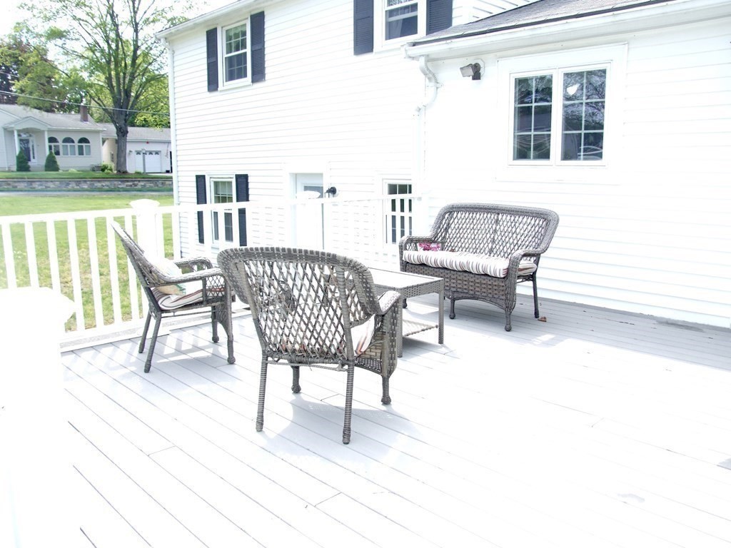 30 Donnell Road Walpole, MA 02032 - Photo 29 of 32 a balcony with table and chairs