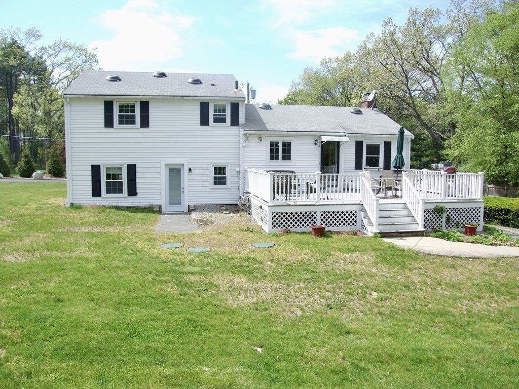 30 Donnell Road Walpole, MA 02032 - Photo 30 of 32 a view of a house with a yard
