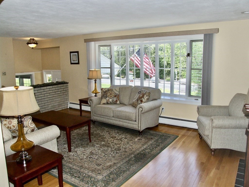 30 Donnell Road Walpole, MA 02032 - Photo 4 of 32 a living room with furniture and a large window