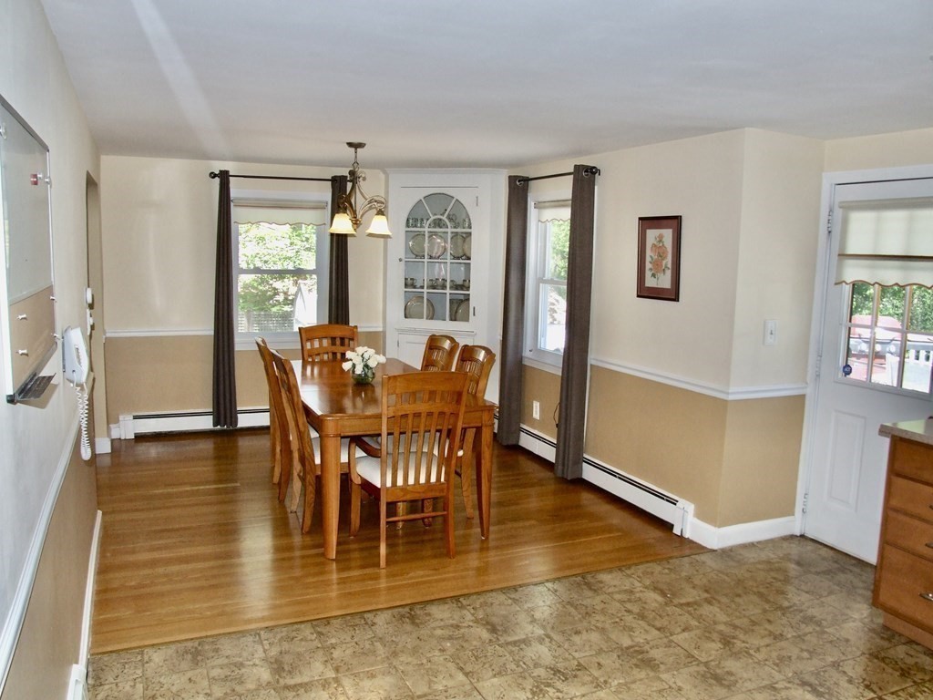 30 Donnell Road Walpole, MA 02032 - Photo 5 of 32 a view of a dining room with furniture and wooden floor