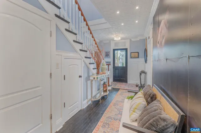 a view of a dining room with furniture and window
