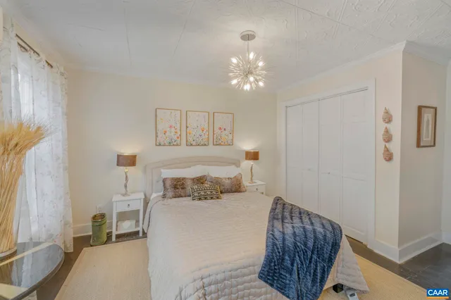 a bathroom with a table and a mirror