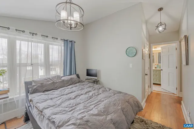 an aerial view of a house with a swimming pool