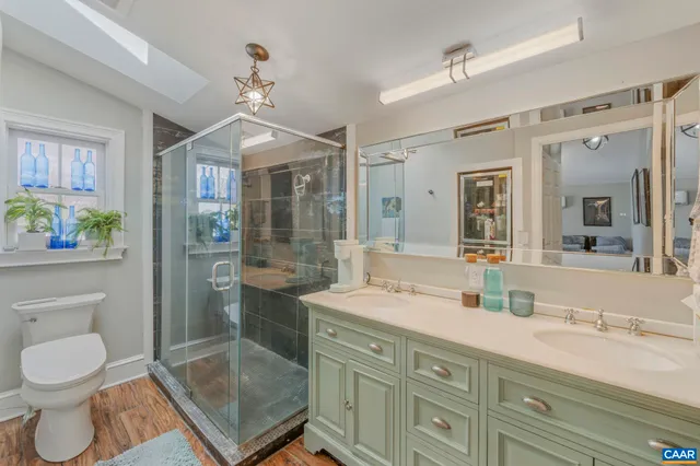 an aerial view of residential house with outdoor space and mountain view