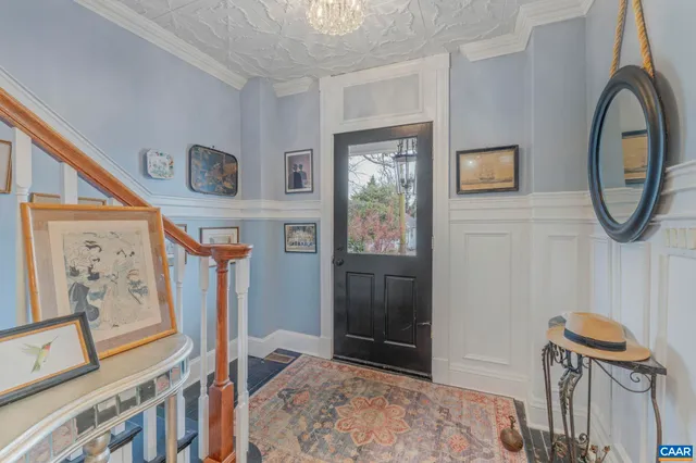 a view of entryway with wooden floor