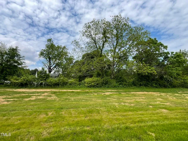 a view of a swimming pool with an outdoor space