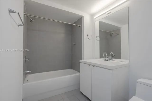 a view of swimming pool with outdoor seating and city view