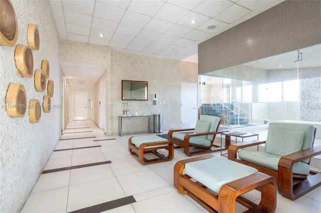 a large white tub sitting in a bathroom