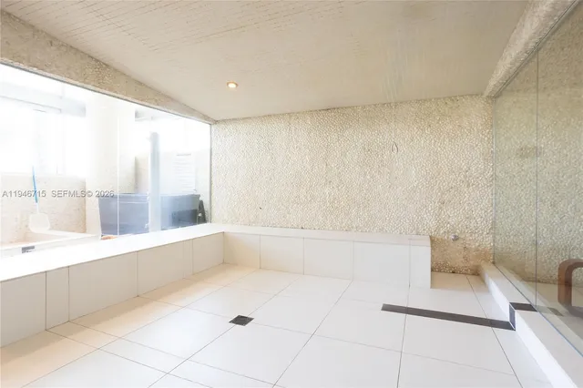 a view of swimming pool with chairs