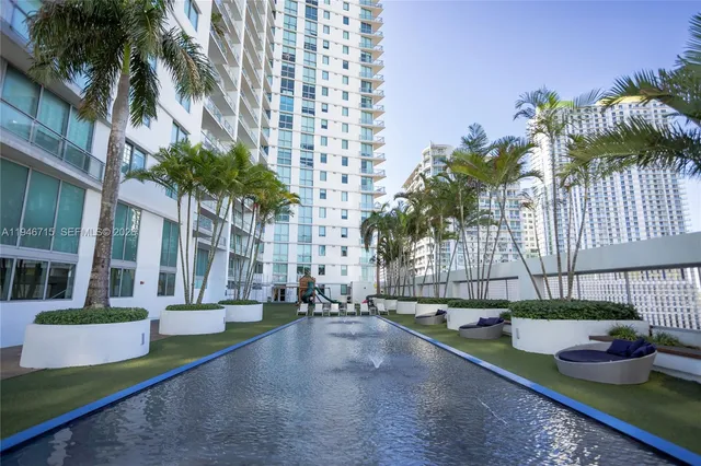 a view of a city with tall buildings