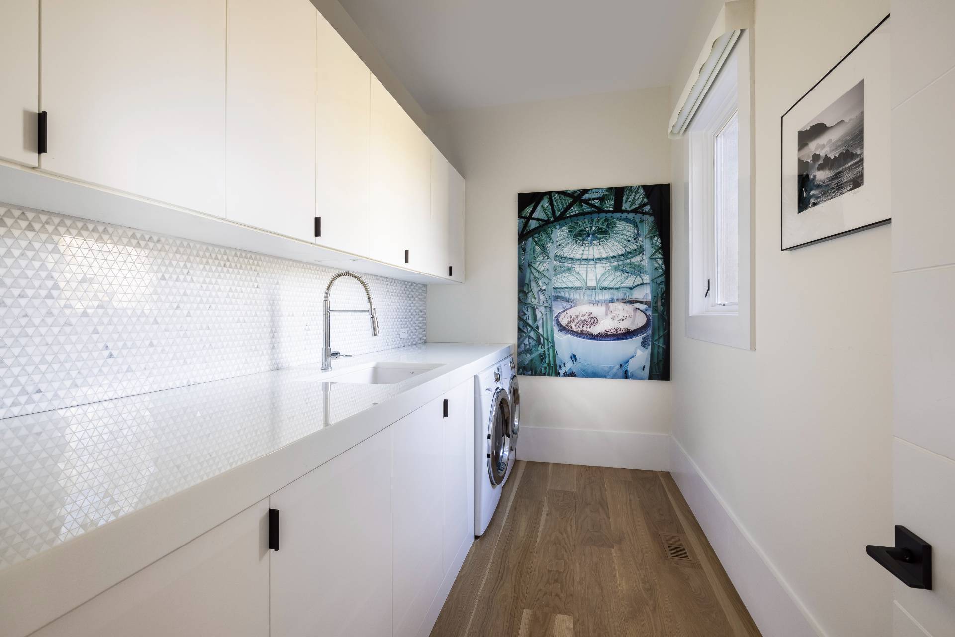 26 Mashomuck Drive Sag Harbor, NY 11963 - Photo 16 of 25 a kitchen with a sink and a refrigerator