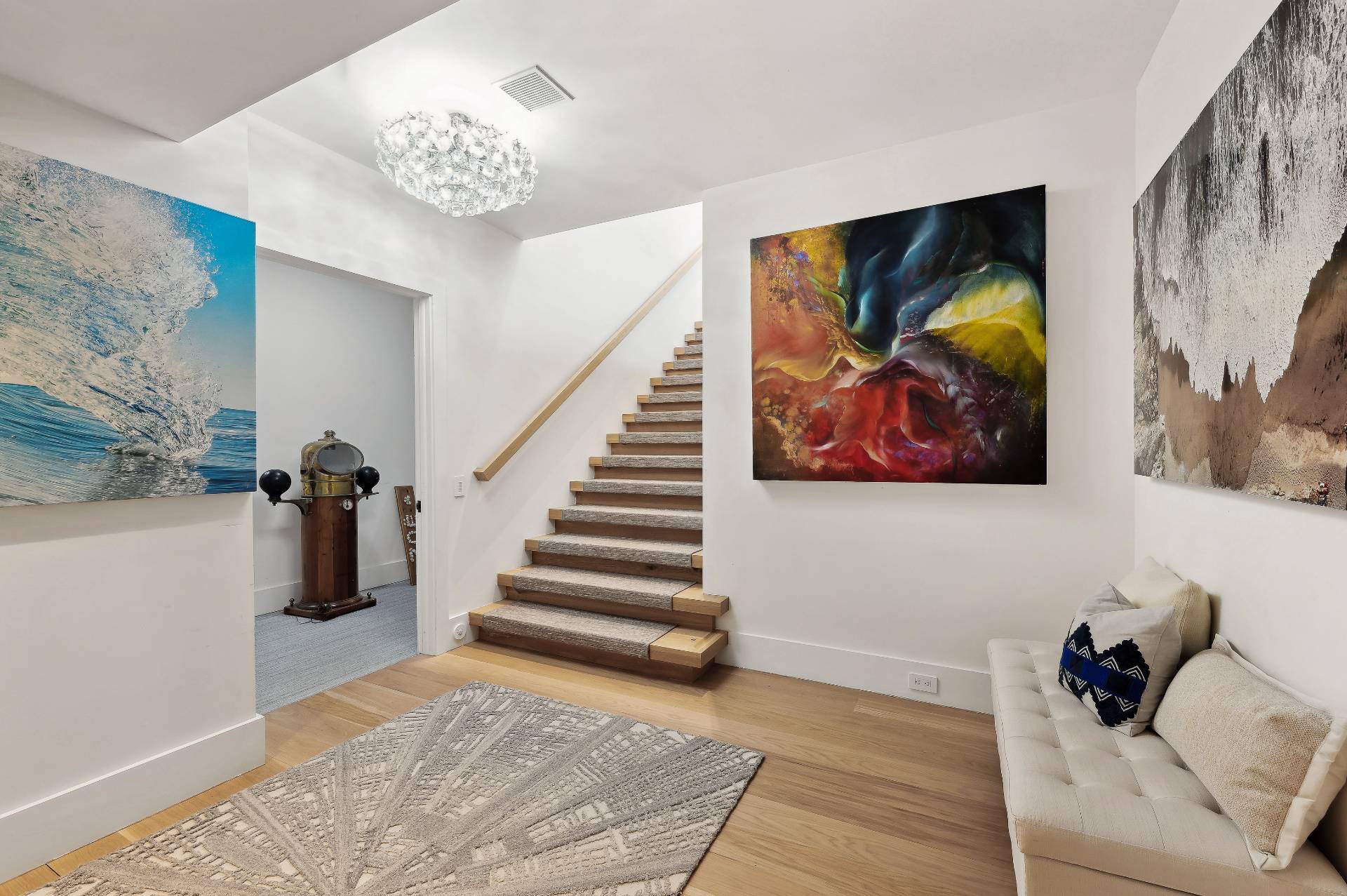 26 Mashomuck Drive Sag Harbor, NY 11963 - Photo 18 of 25 a bedroom with a bed and a painting on the wall