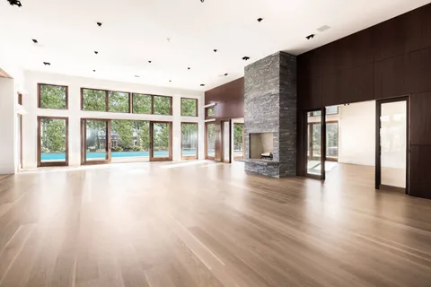 a view of an entryway with wooden floor