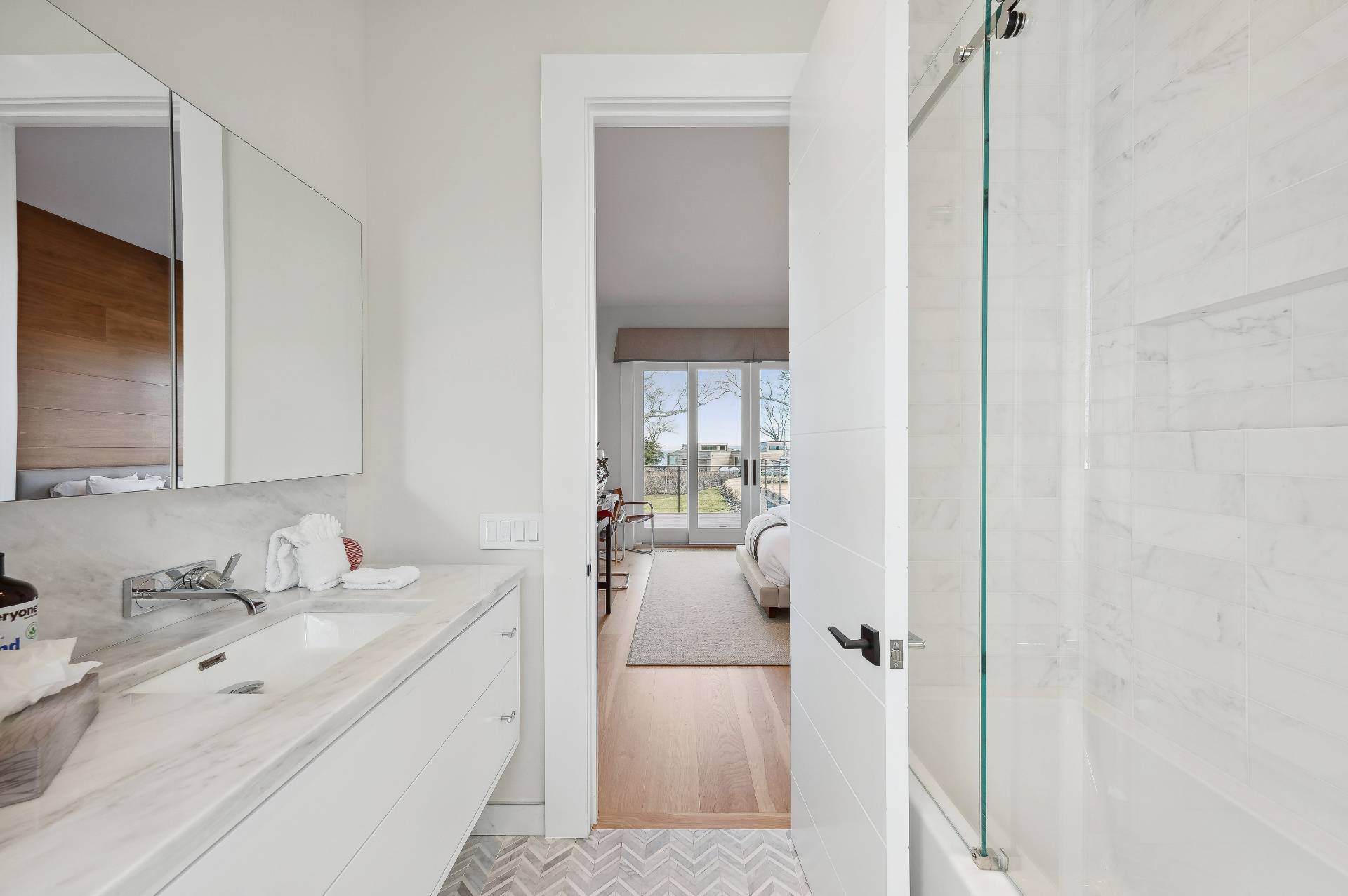 26 Mashomuck Drive Sag Harbor, NY 11963 - Photo 22 of 25 a en suite bathroom with a sink double vanity and mirror