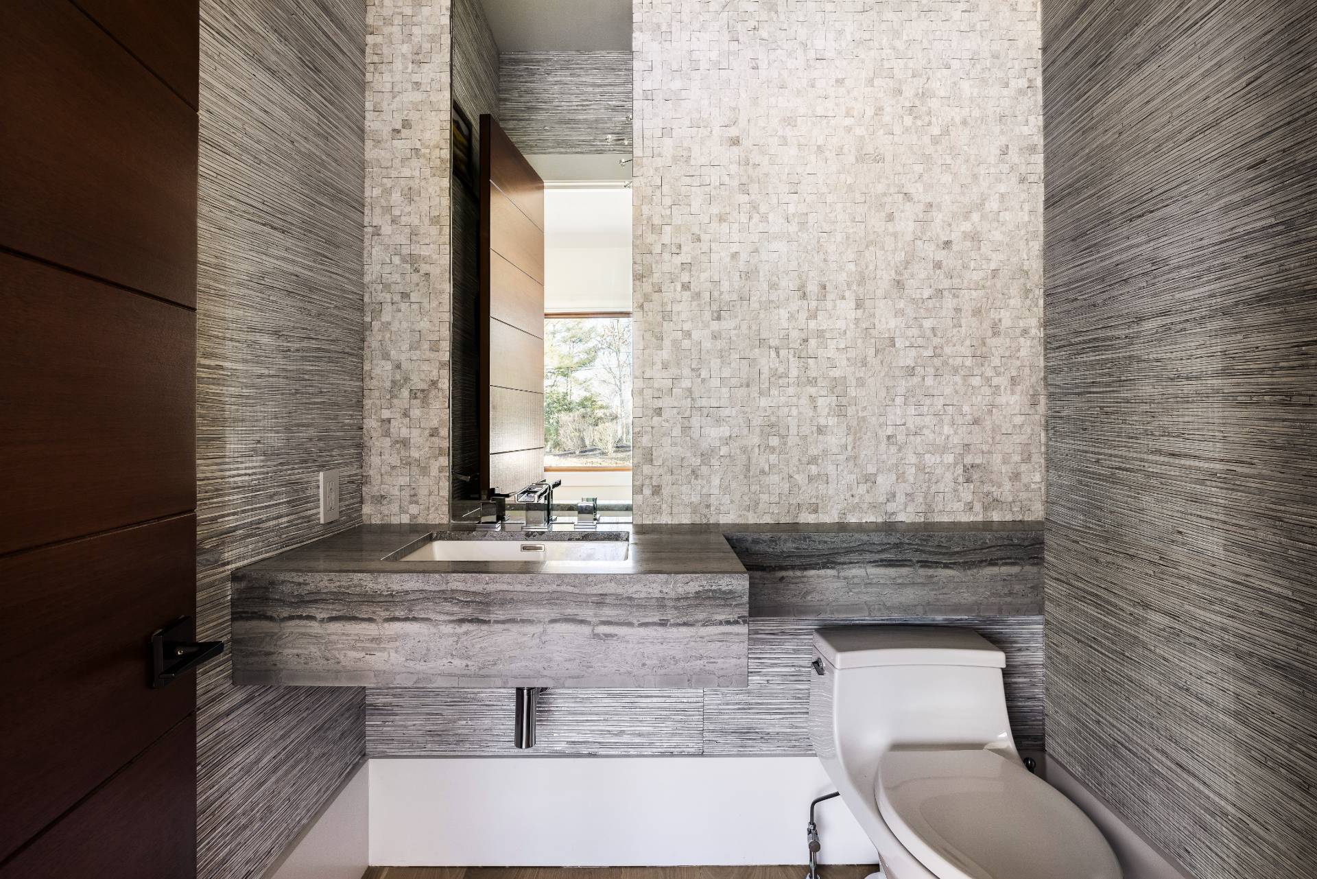 26 Mashomuck Drive Sag Harbor, NY 11963 - Photo 8 of 25 a bathroom with a toilet and a sink