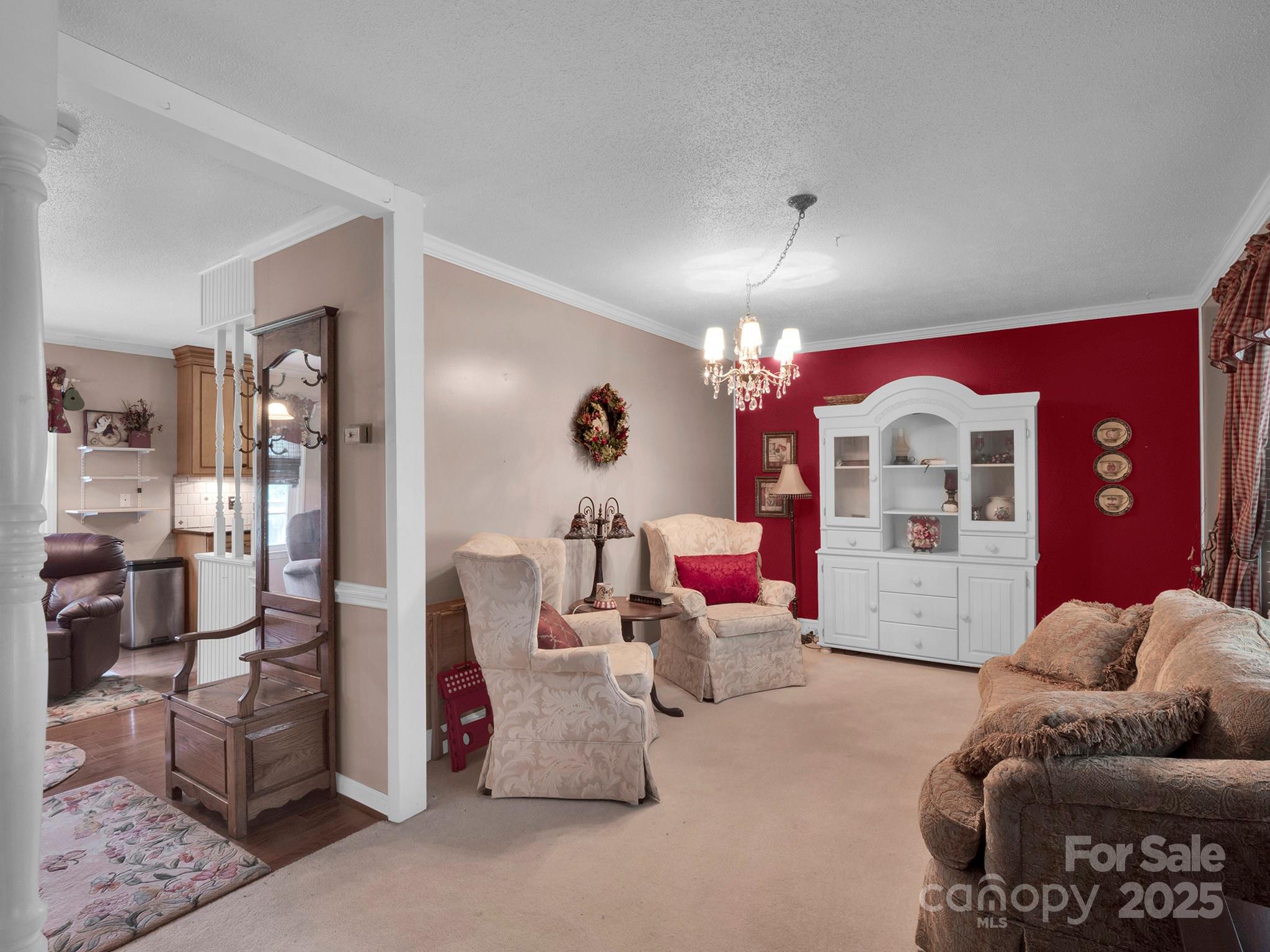 409 State Rd S-46-27 Clover, SC 29710 - Photo 34 of 43 a living room with furniture and kitchen view