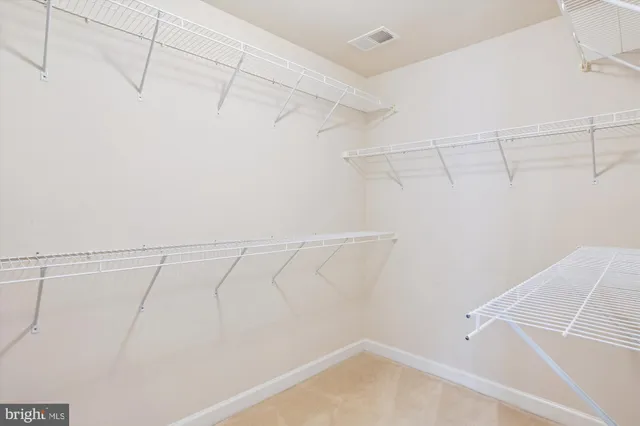 a view of a room with racks on the wall