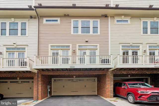 a front view of a building with many windows
