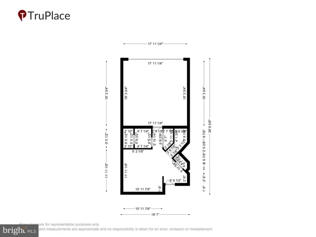 a picture of a bench in front of a wall