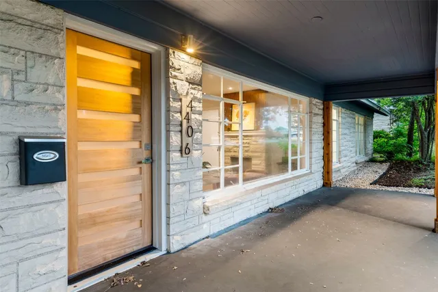a view of a porch with wooden floor and outer view