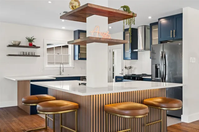 a lobby with furniture and wooden floor