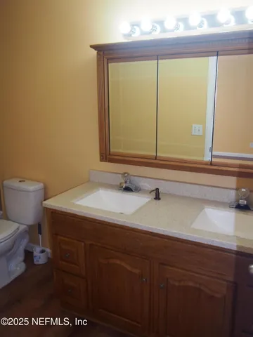 a bathroom with a sink and a toilet