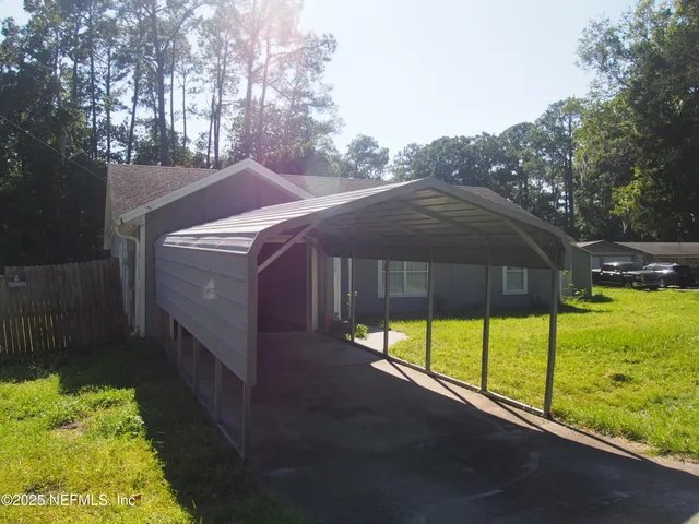 a house view with a garden space
